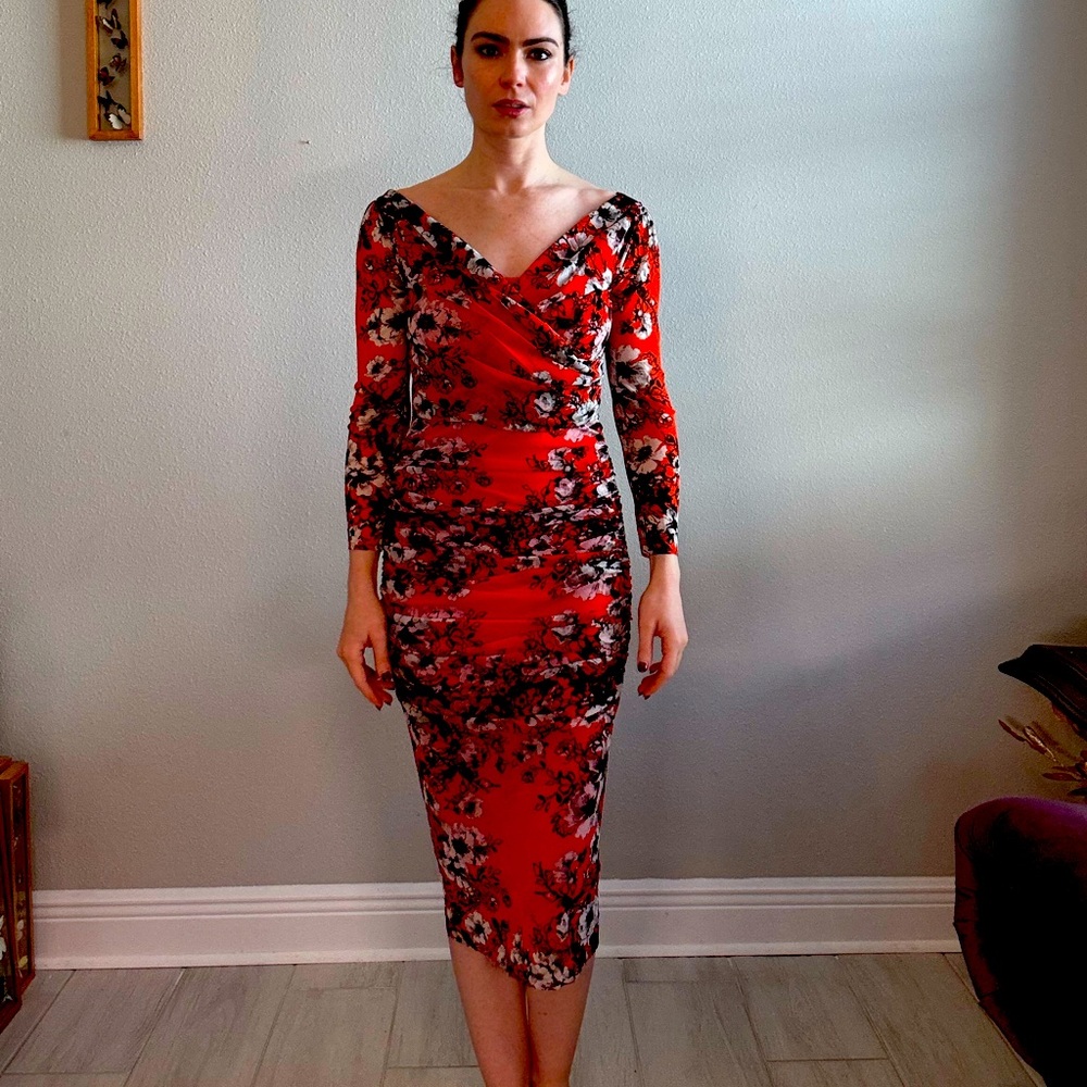 Fuzzi stretch dress. Made in Italy.Orange floral print. Ruched.Long sleeve.Midi.